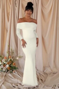 Pretty Perfect | White Maternity Ruched Mesh Bardot Maxi Dress -ENY Clothing Shop CL126177 White Maternity Ruched Mesh Bardot Maxi Dress0 0853b0d2 8278 4462 a9a9 d270fe335f9a