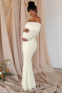 Pretty Perfect | White Maternity Ruched Mesh Bardot Maxi Dress -ENY Clothing Shop CL126177 White Maternity Ruched Mesh Bardot Maxi Dress2 bc8f5820 571d 4938 839e e7372b1a61be