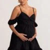 Kai | Black Cami Babydoll Maternity Mini Dress With Ruffle Cold Shoulder Sleeves 1 Kai | Black Cami Babydoll Maternity Mini Dress With Ruffle Cold Shoulder Sleeves -ENY Clothing Shop WB BR CL129228 KaiBlackCamiBabydollMaternityMiniDressWithRuffleColdShoulderSleeves1