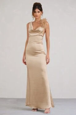 Cherish Me | Gold Satin Asymmetric Cowl Maxi Dress With Feather Strap -ENY Clothing Shop WB CL1283370072 CherishMeGoldBodyconMidiDressWithStatementFeatherTrim2