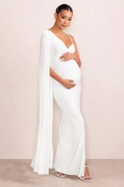 The Crown | White Asymmetric Plunge Maternity Maxi Dress With Cape Sleeve