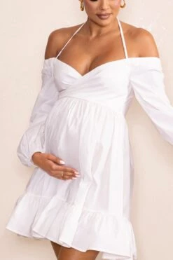 Kyra | White Babydoll Maternity Mini Dress With Long Cold Shoulder Puff Sleeves -ENY Clothing Shop WB CL129229 KyraWhiteBabydollMaternityMiniDresswithLongColdShoulderPuffSleeves1