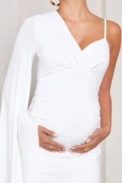 Rhea | White V-Neck Split Maternity Maxi Dress With Cape Sleeve -ENY Clothing Shop WB CL129572005 RheaWhiteV NeckSplitMaternityMaxiDressWithCapeSleeve3