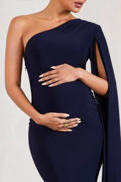 Amara | Navy One-Shoulder Maternity Maxi Dress With Cape -ENY Clothing Shop WB CL129596015 AmaraNavyOne ShoulderMaternityMaxiDressWithCape2