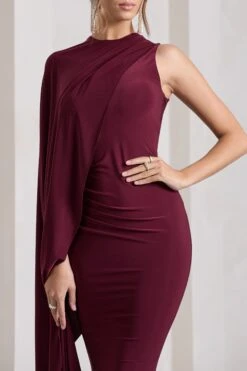 Unveil | Burgundy One-Sleeve Cape Maxi Dress 9 Unveil | Burgundy One-Sleeve Cape Maxi Dress -ENY Clothing Shop WB CL129803069 UnveilBurgundyOne SleeveCapeMaxiDress7